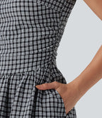 Robe mini trapèze vichy sans manches à col bateau, détails froncés, fermeture invisible et poches