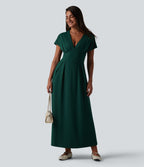 Robe midi à manches courtes chauve-souris et col en V avec poches