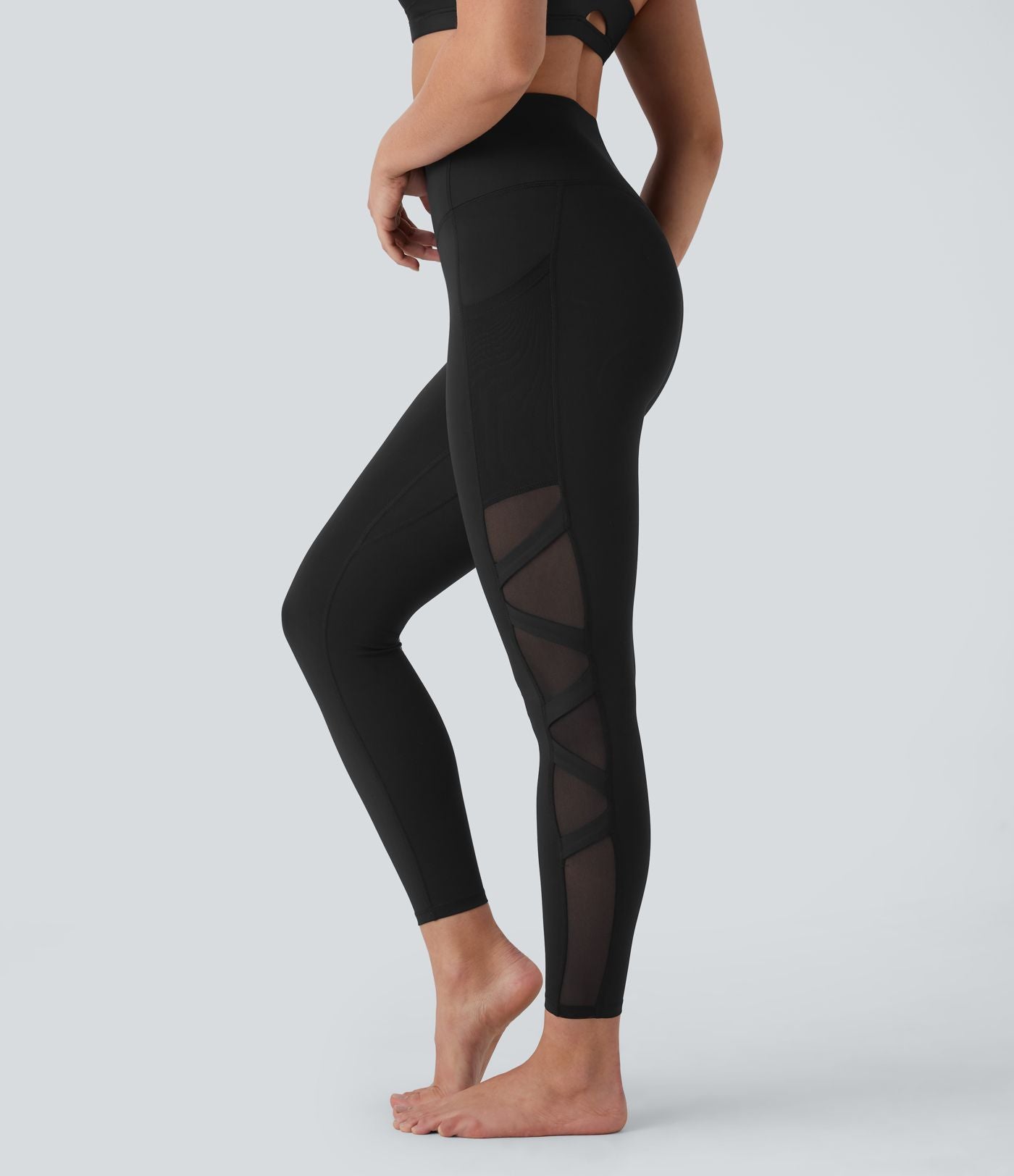 Legging de yoga 7/8 SpeedWave™ taille haute avec poches latérales et empiècements en mesh contrastés à séchage rapide