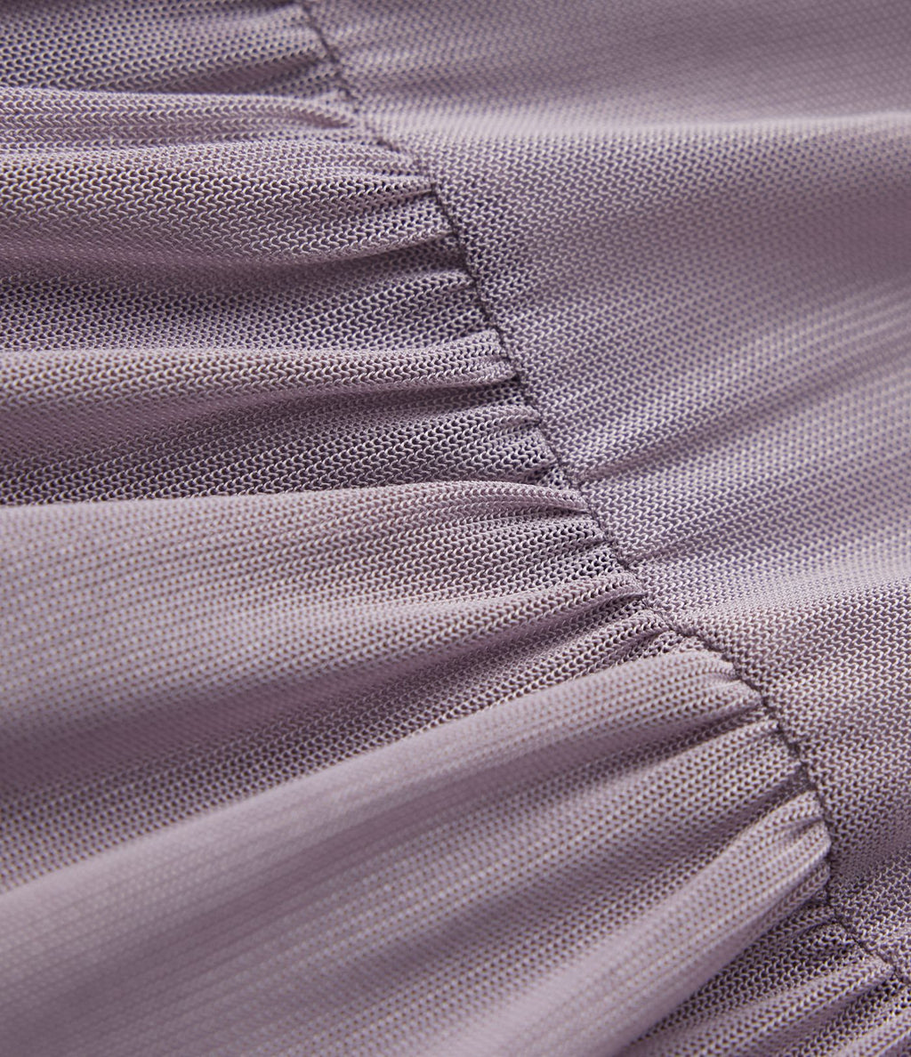 Jupe-short de tennis mini taille haute croisée fluide avec poches
