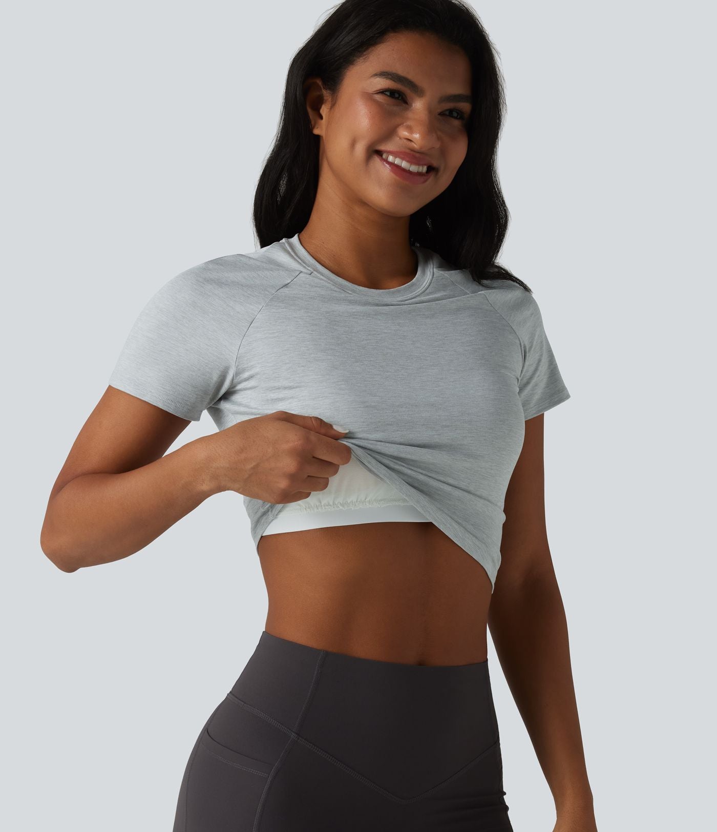 Haut de sport yoga col rond manches courtes avec soutien-gorge intégré