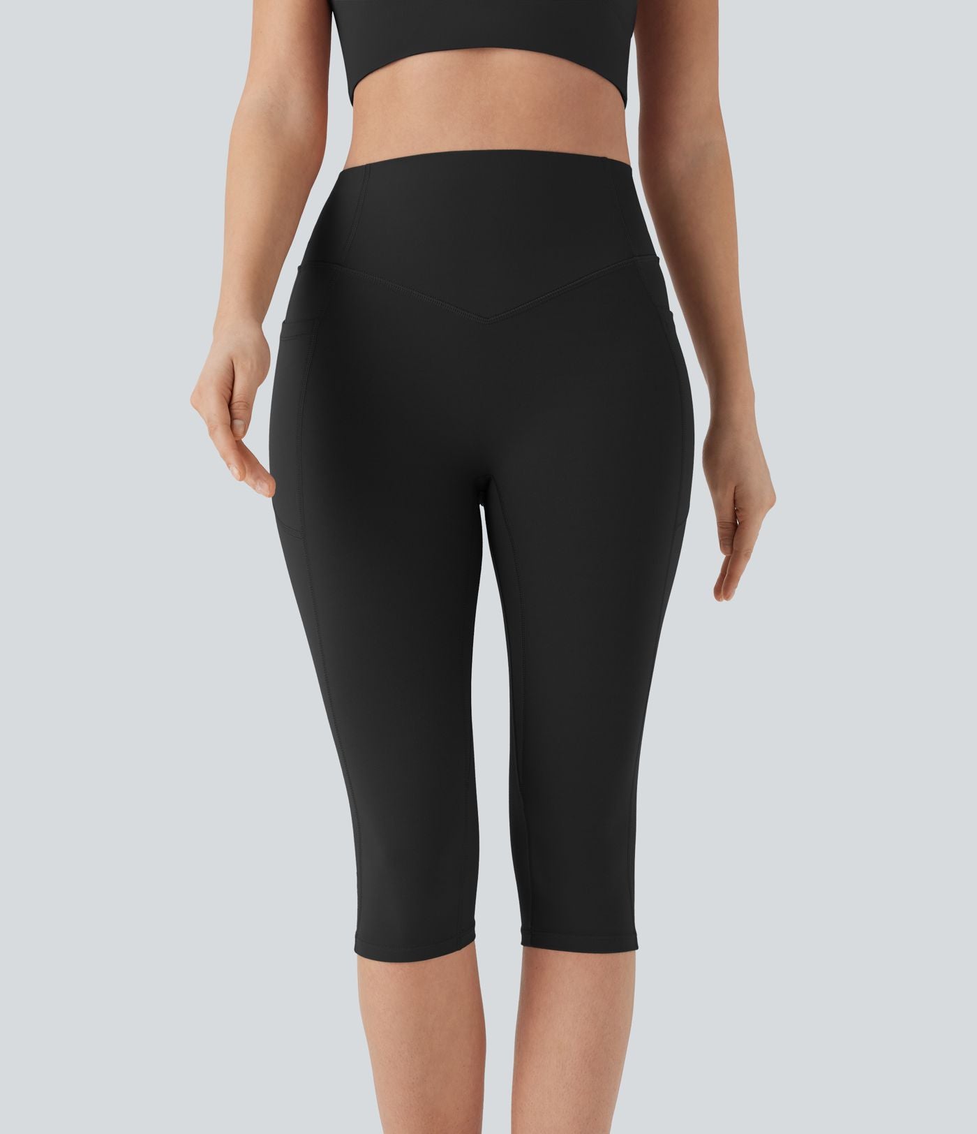 Legging 7/8 corsaire d'entraînement gainant galbant taille haute avec effet scrunch et poches Halara UltraSculpt™
