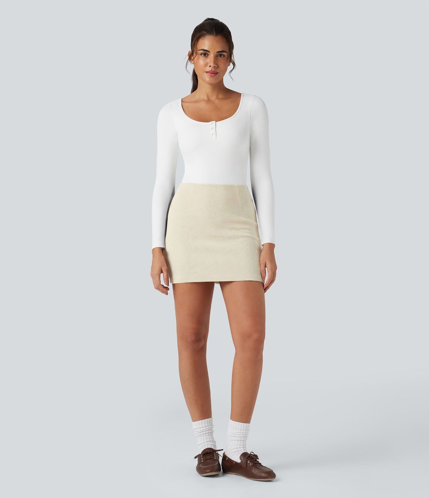 Jupe mini moulante côtelée 2-en-1 taille haute