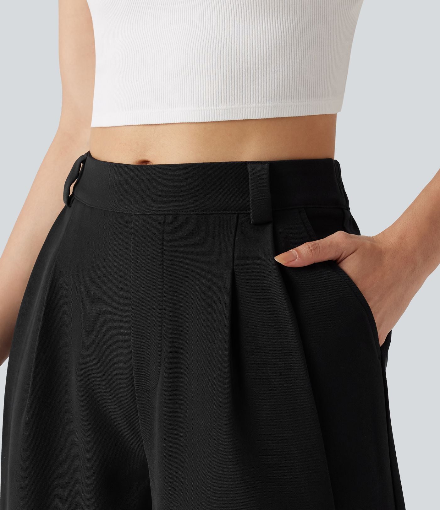 Pantalon tailleur large, taille moyenne, à poches