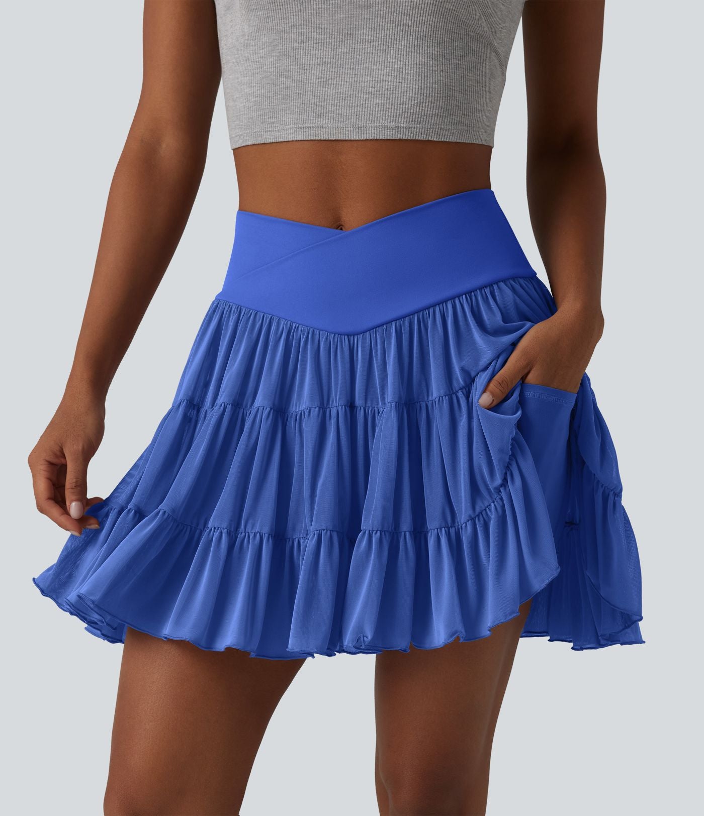 Jupe mini de tennis 2 en 1 croisée évasée taille haute avec poches - longueur allongée