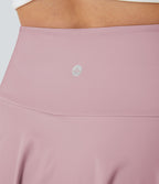 Jupe de tennis SoftlyZero™ Airy taille haute confortable 2-en-1 poches latérales croisées évasée effet frais
