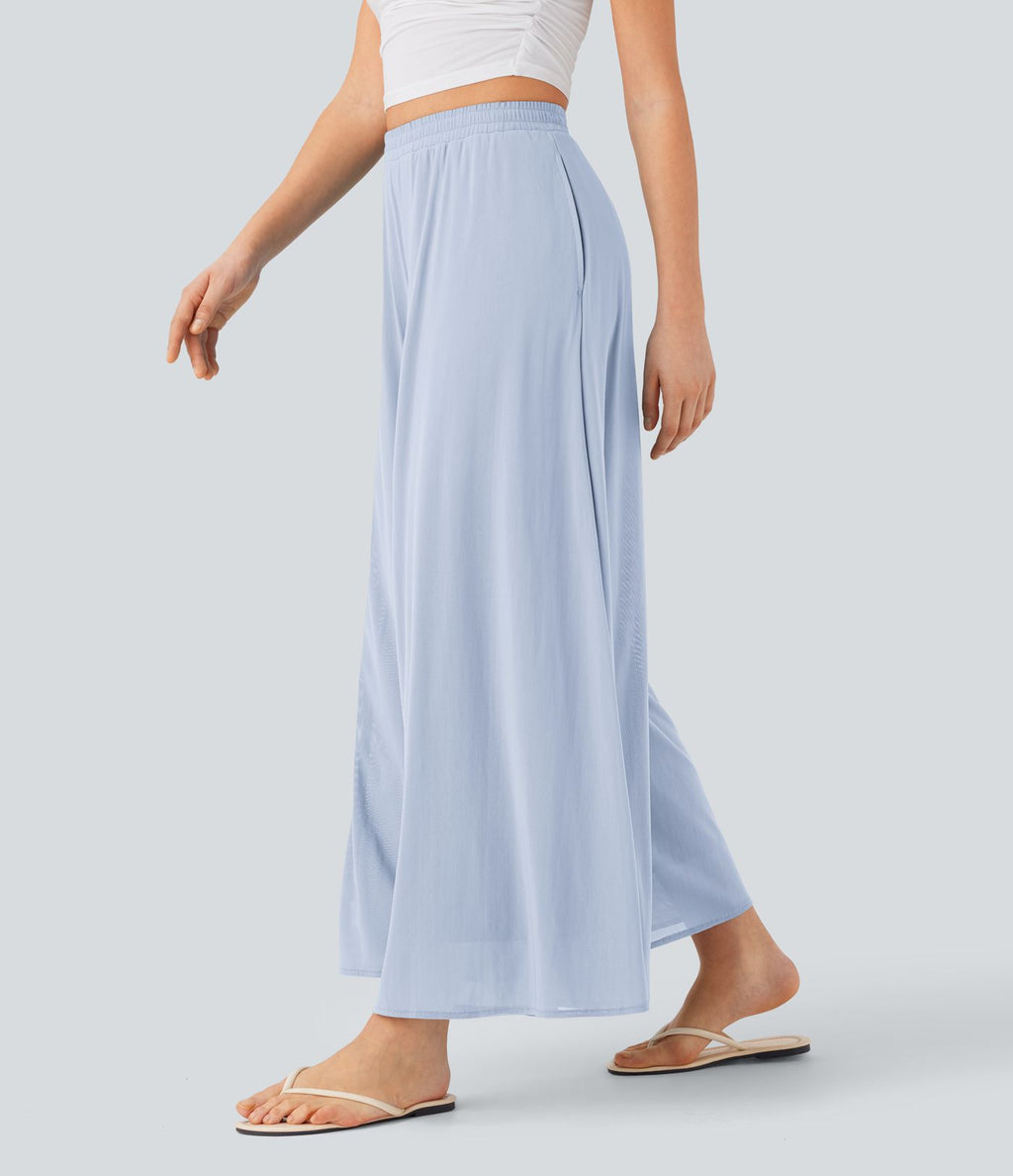 Pantalon fluide et ample avec superposition en mesh, poches latérales et taille haute