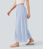 Pantalon fluide et ample avec superposition en mesh, poches latérales et taille haute
