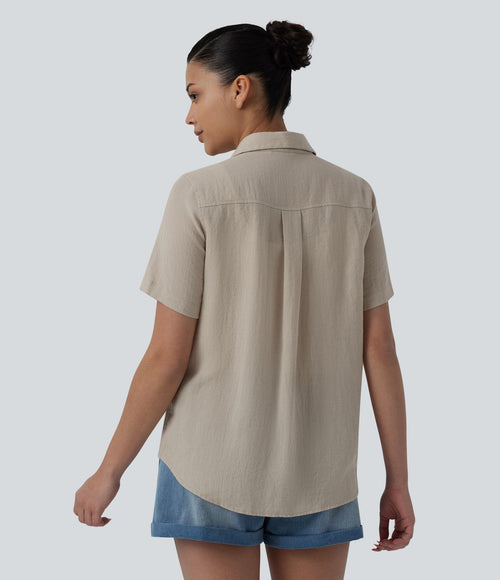 Chemise décontractée à manches courtes avec col et ourlet arrondi, aspect lin