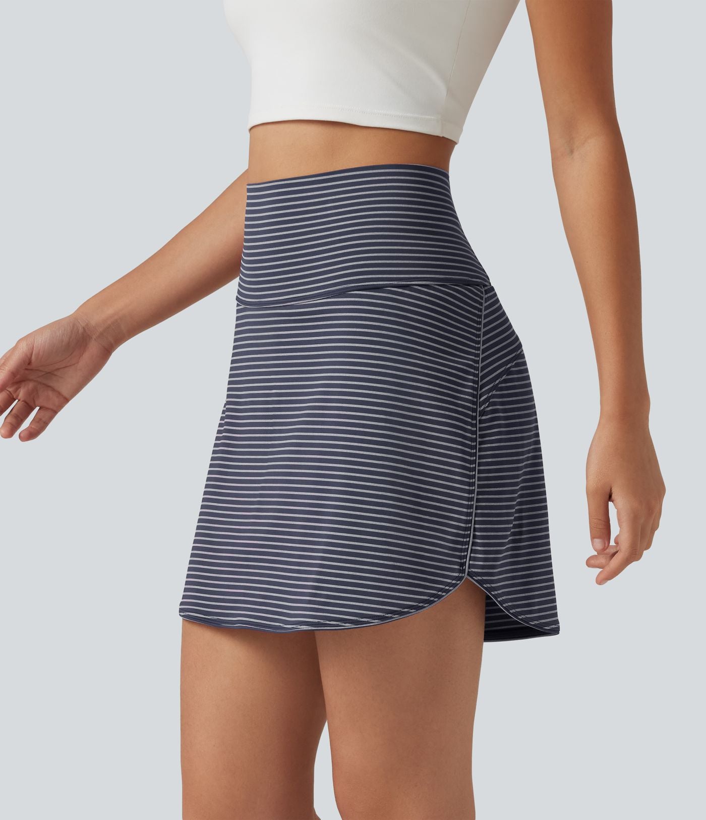Mini-jupe de golf 2 en 1 à rayures, taille ultra haute, effet ventre plat, ourlet arrondi et poches