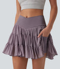Jupe-short de tennis mini taille haute croisée fluide avec poches