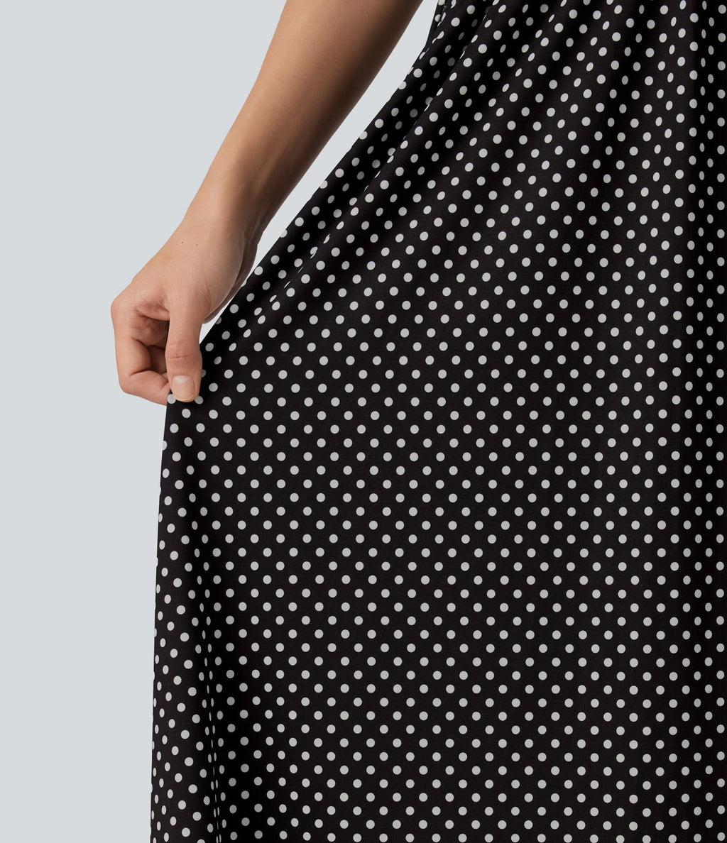 Robe fluide décontractée midi sans manches dos nu croisée à pois avec poches
