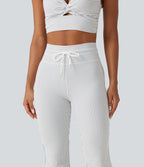 Pantalon de yoga flare taille haute rayé avec cordon de serrage et poches