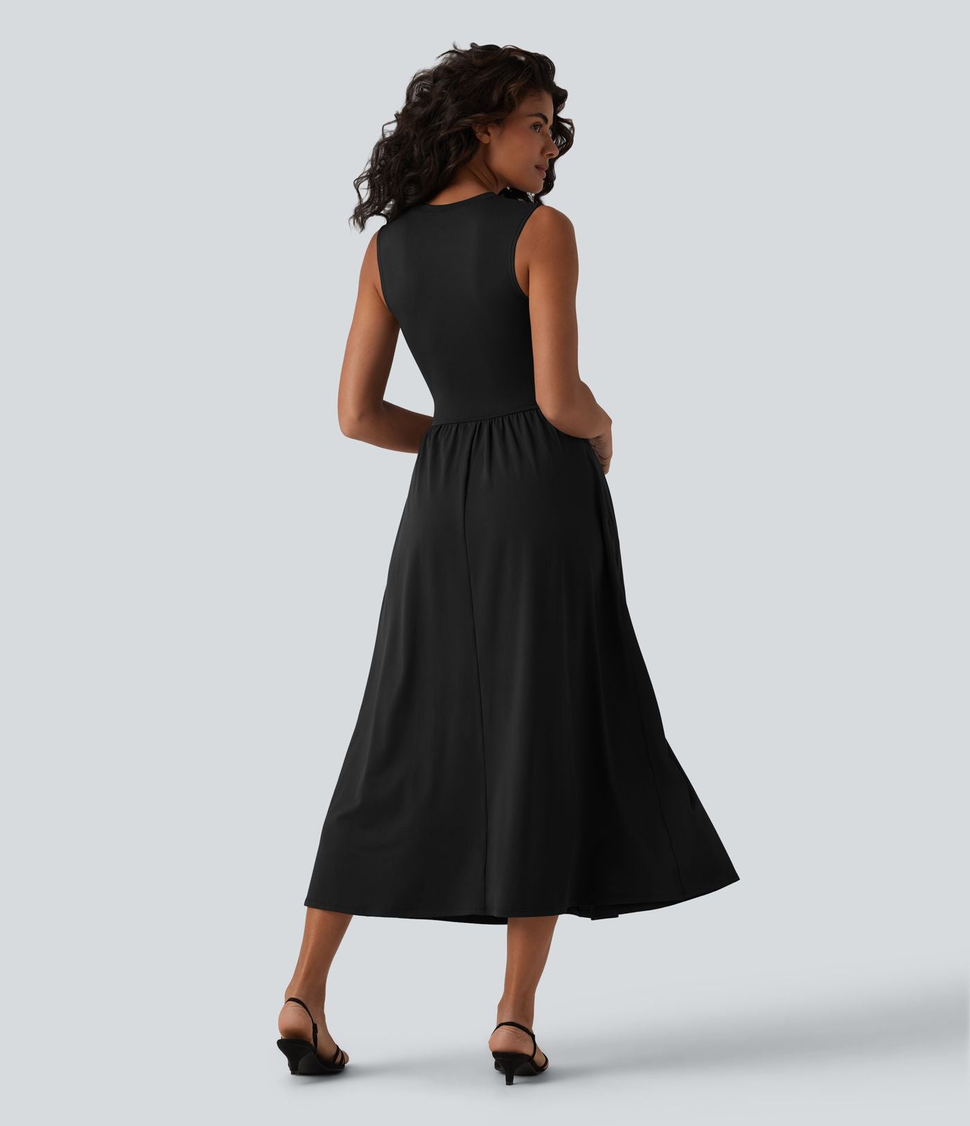 Robe midi casual fluide sans manches à col rond avec poches