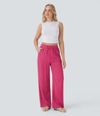 Pantalon large fluide taille haute avec cordon de serrage, poches latérales et aspect lin