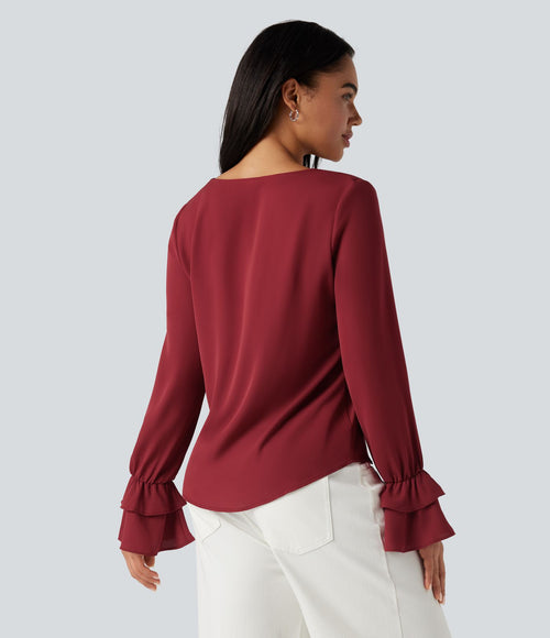 Blouse col V à volants manches longues