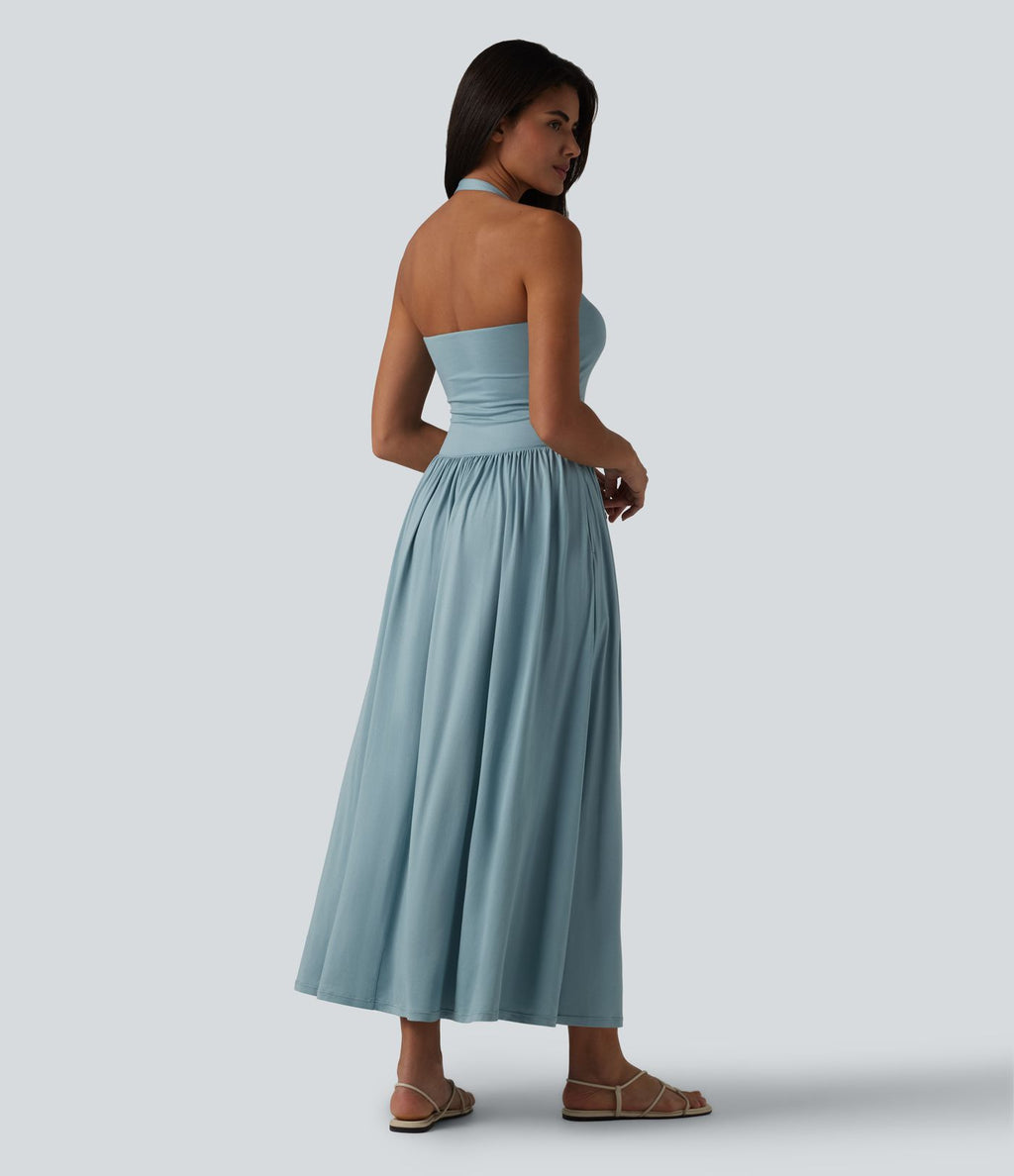 Robe longue fluide dos nu avec tour de cou, brassière intégrée et poches