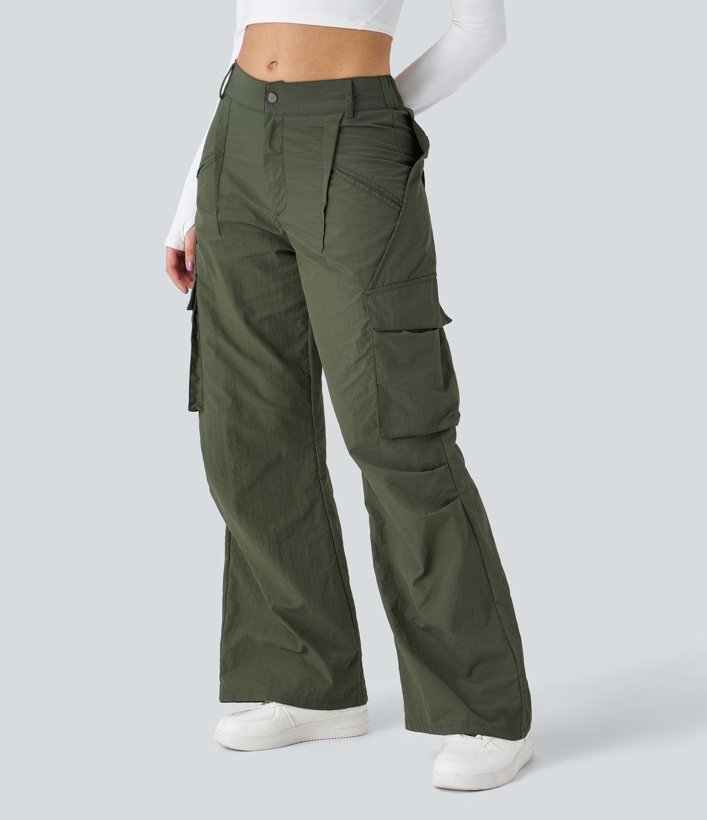 Pantalon cargo décontracté à taille moyenne, jambes larges, boutons, fermeture éclair et poches latérales