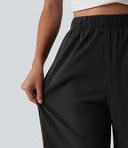 Pantalon casual 7/8 aspect lin stretch coupe droite taille haute avec poches