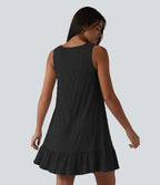 Robe courte décontractée sans manches à col rond, soutien-gorge intégré et ourlet à volants