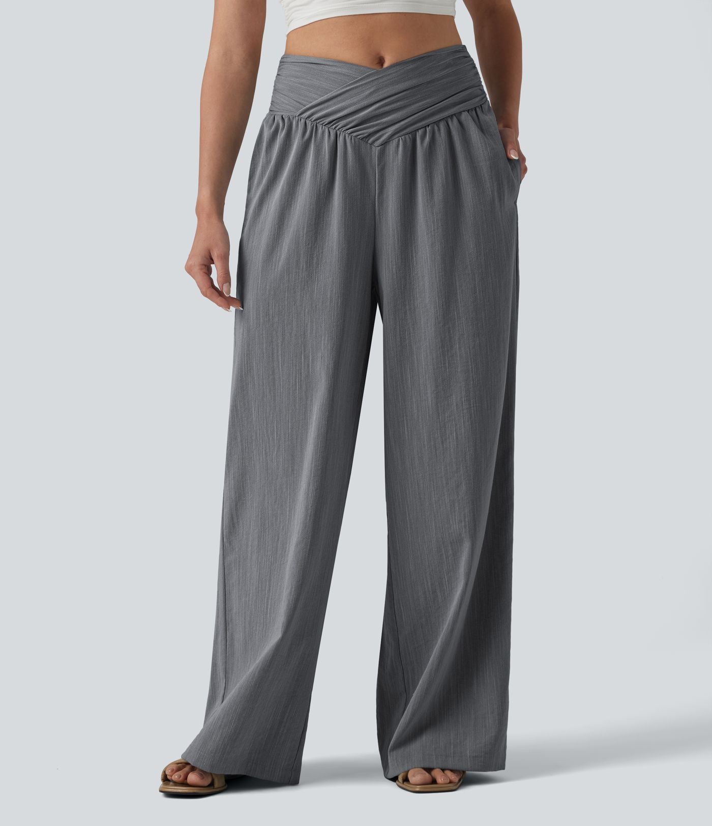 Pantalon baggy effet lin taille haute croisée avec détails froncés et poche