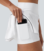 Jupe de tennis mini Breezeful™ plissée 2-en-1 taille haute, réfléchissante, séchage rapide, avec poches