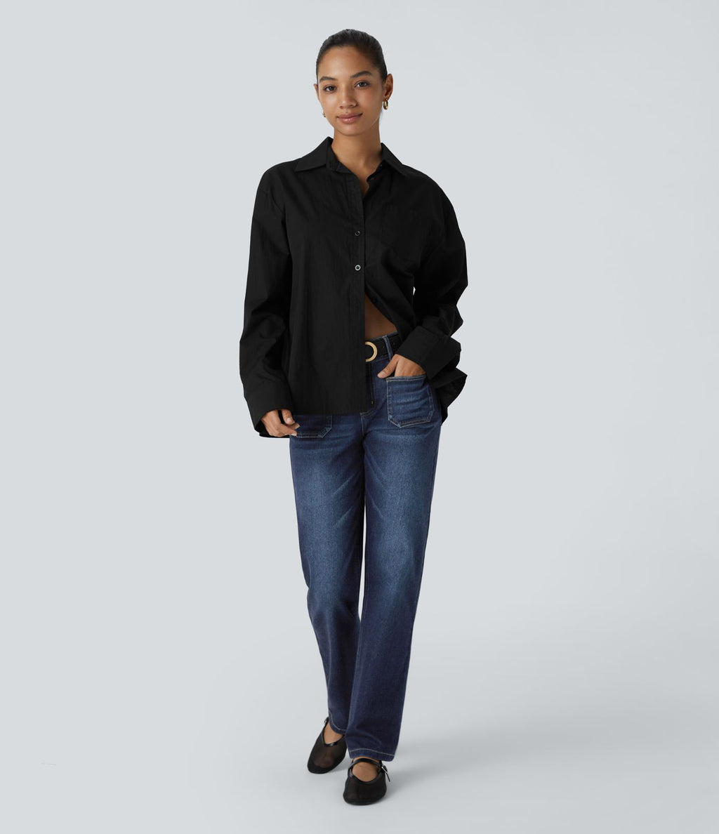 Jean décontracté délavé taille basse en maille extensible, coupe droite avec poches avant et fermeture zippée