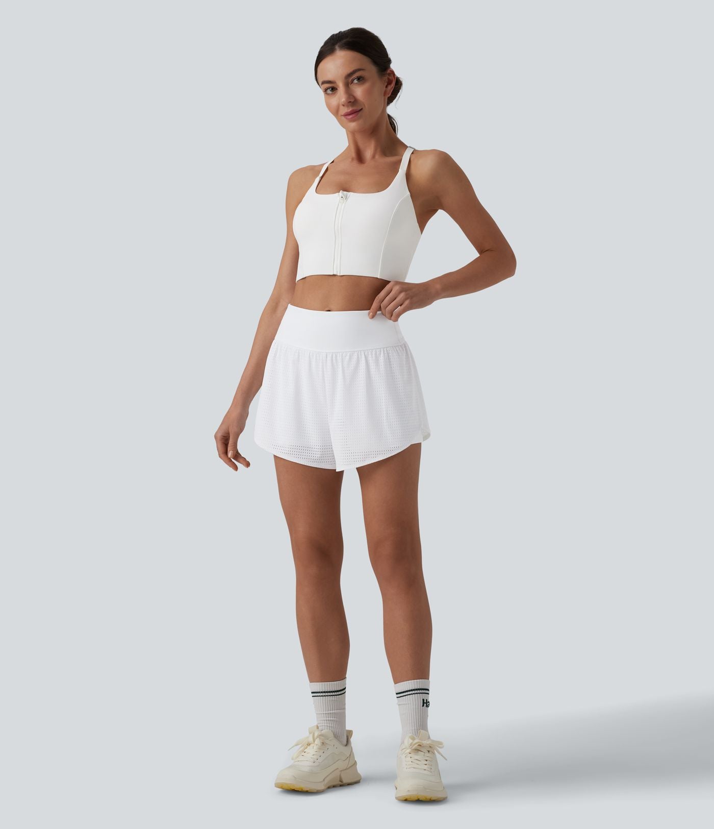 Short yoga 2-en-1 gainant taille haute à pois réfléchissants, ourlet arrondi croisé et œillets avec poches
