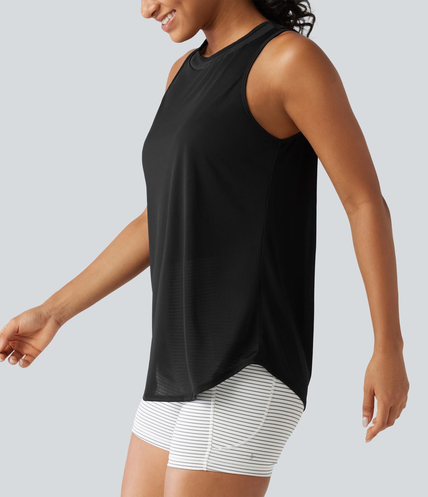 Débardeur de running longueur allongée en mesh contrasté avec ourlet arrondi