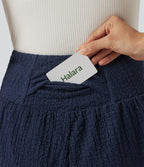Short baggy 2-en-1 casual en tissu froissé taille haute avec poches