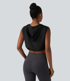 Débardeur de yoga court à capuche avec demi-zip