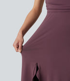 Robe mi-longue fluide de soirée dos nu croisé avec fente, ourlet à volants et soutien-gorge intégré