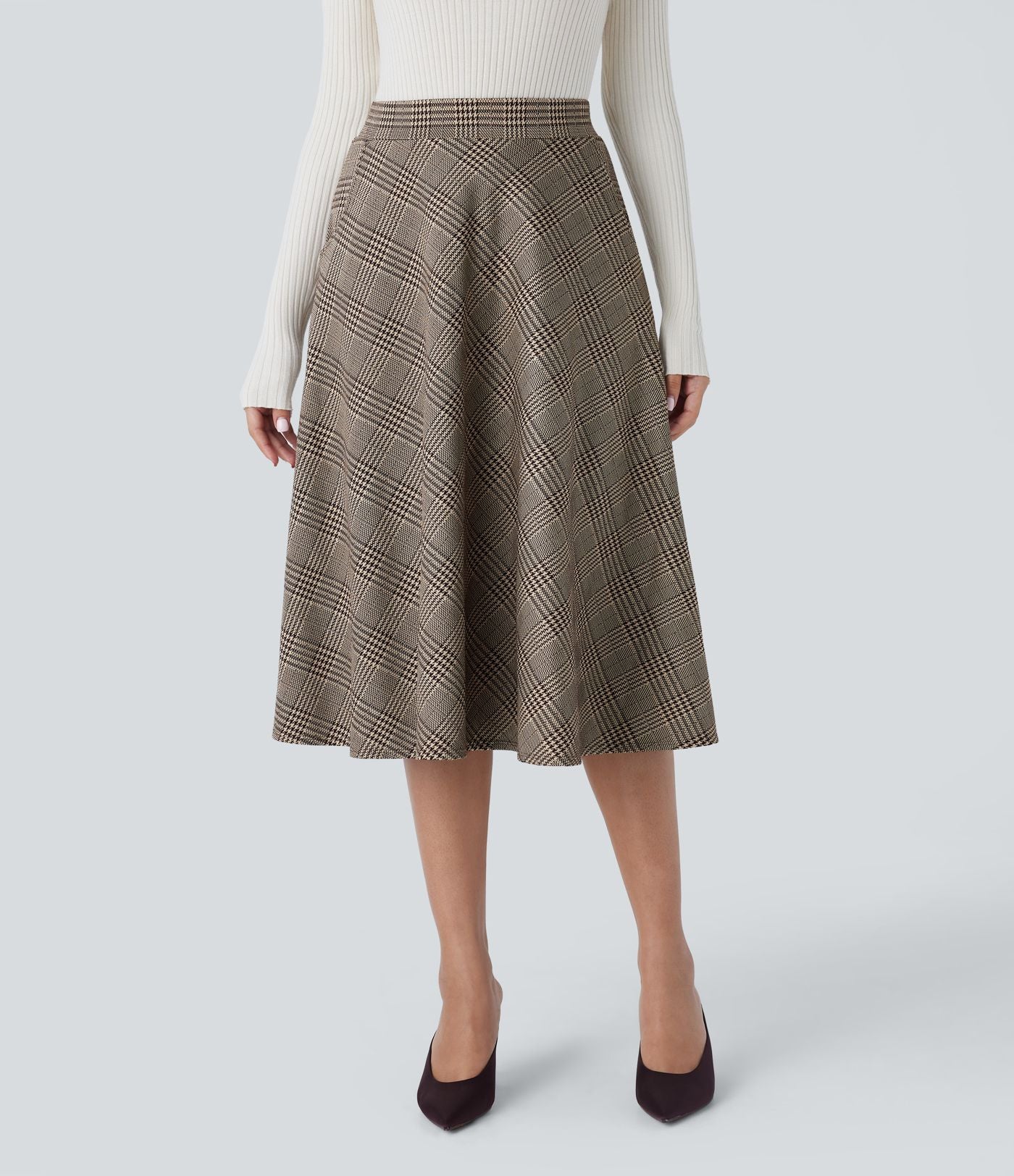 Jupe midi évasée à taille haute et poches latérales, motif pied-de-poule