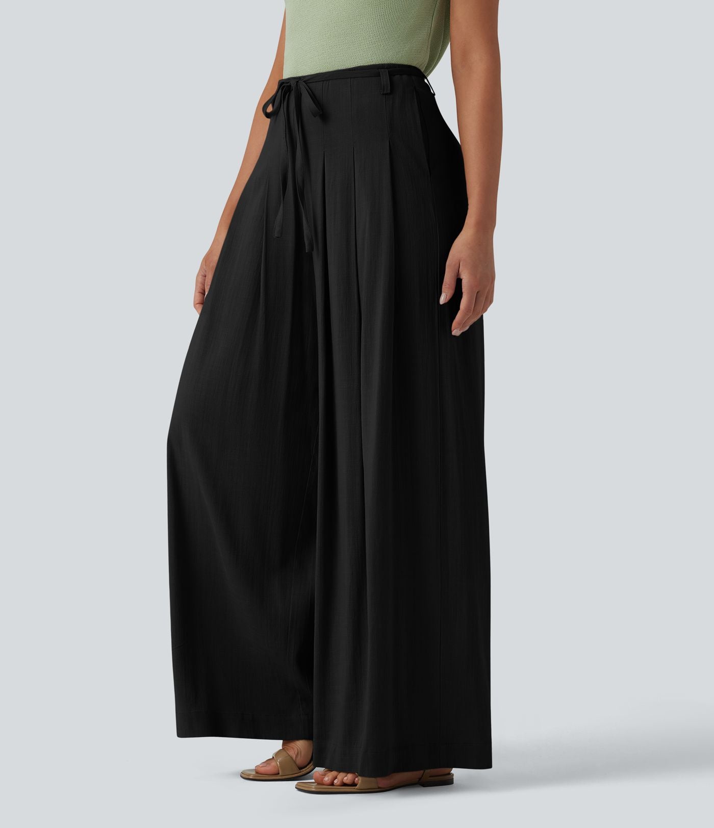 Pantalon large fluide taille mi-haute aspect lin avec ceinture et poches