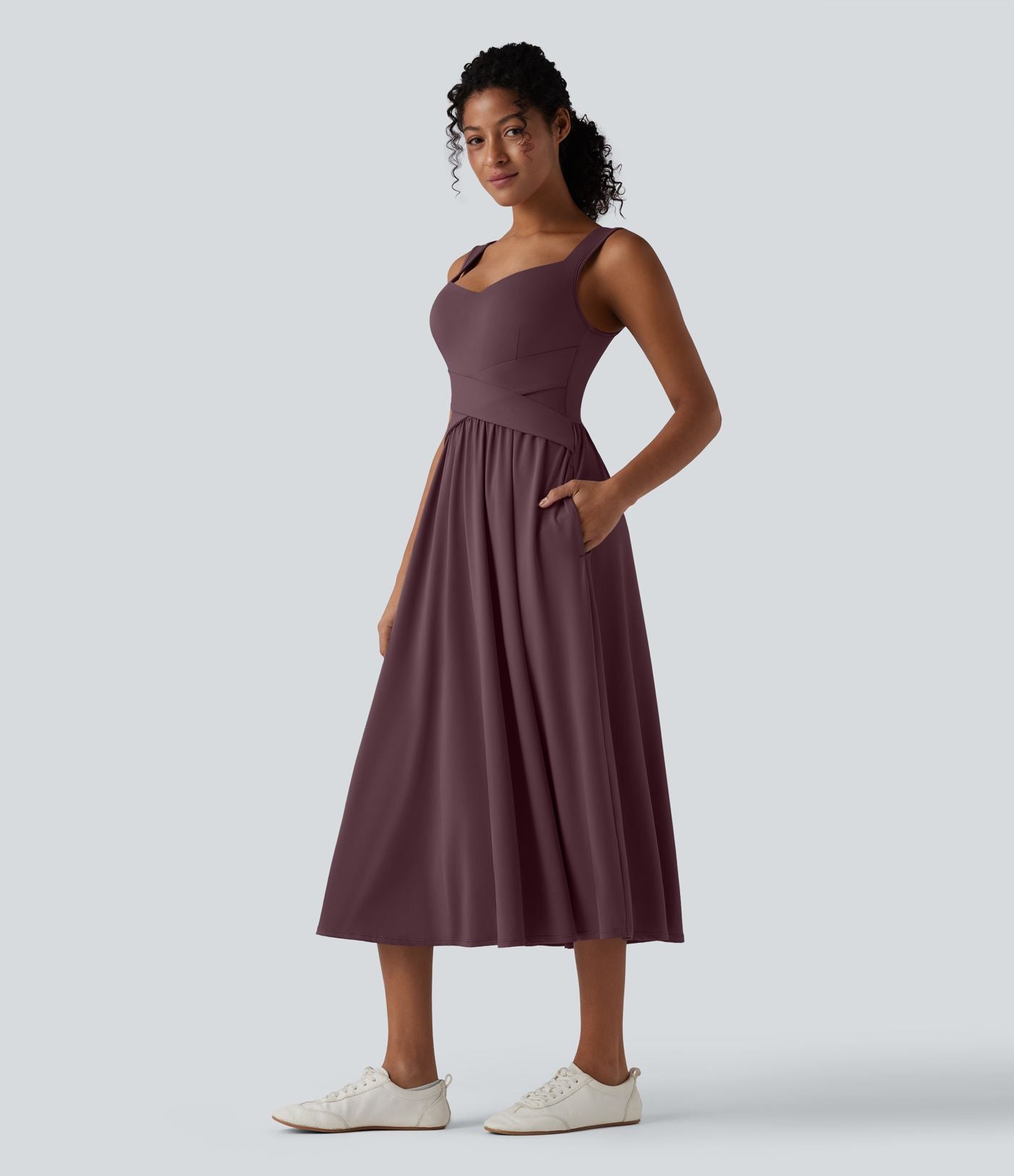 Robe midi fluide sans manches dos croisé ouvert avec poches