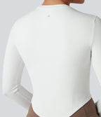 Haut de sport yoga col rond à manches longues avec passants pouces et ourlet arrondi sans couture Seamless Flow