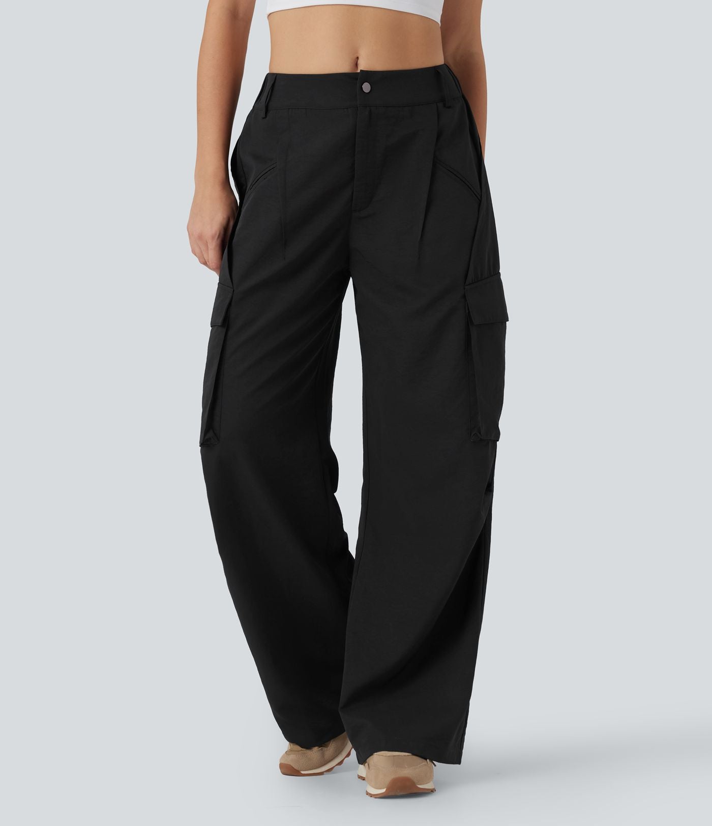 Pantalon cargo décontracté à taille moyenne, jambes larges, boutons, fermeture éclair et poches latérales