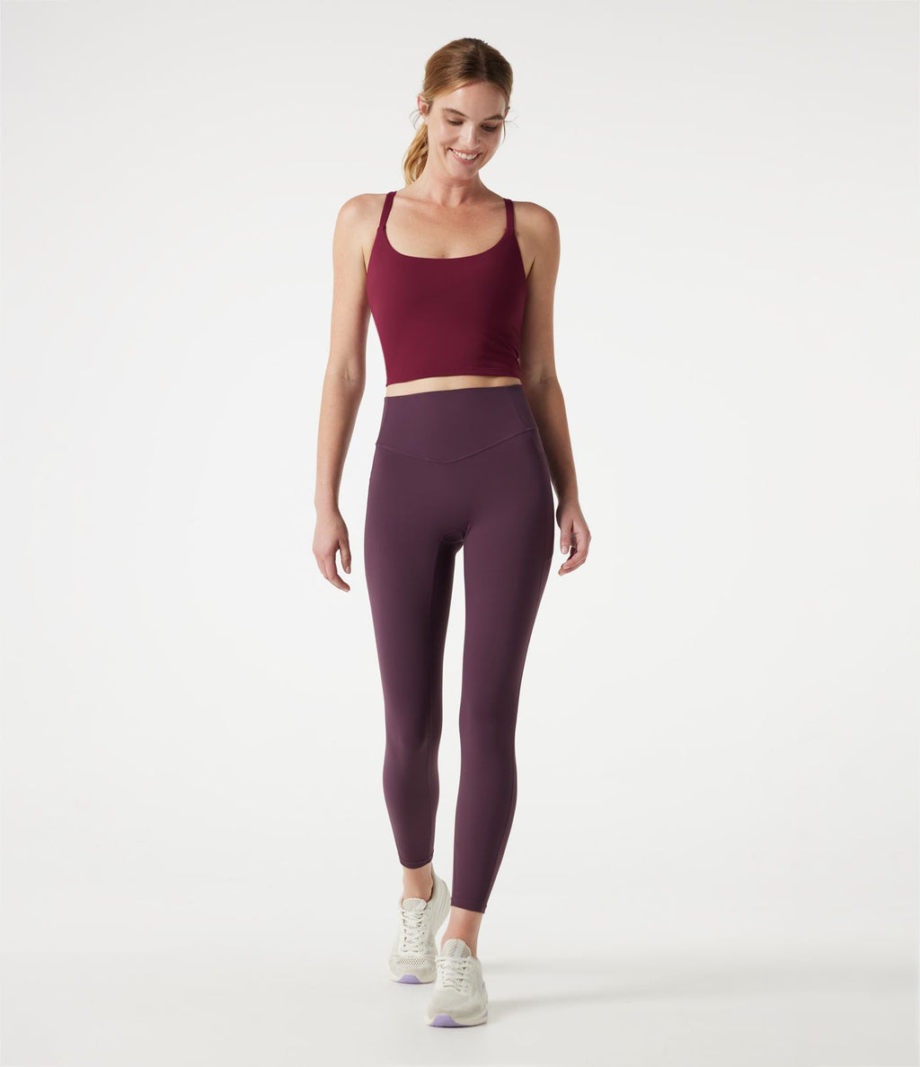 Caraco de yoga court col rond échancré avec brassière intégrée et ourlet croisé