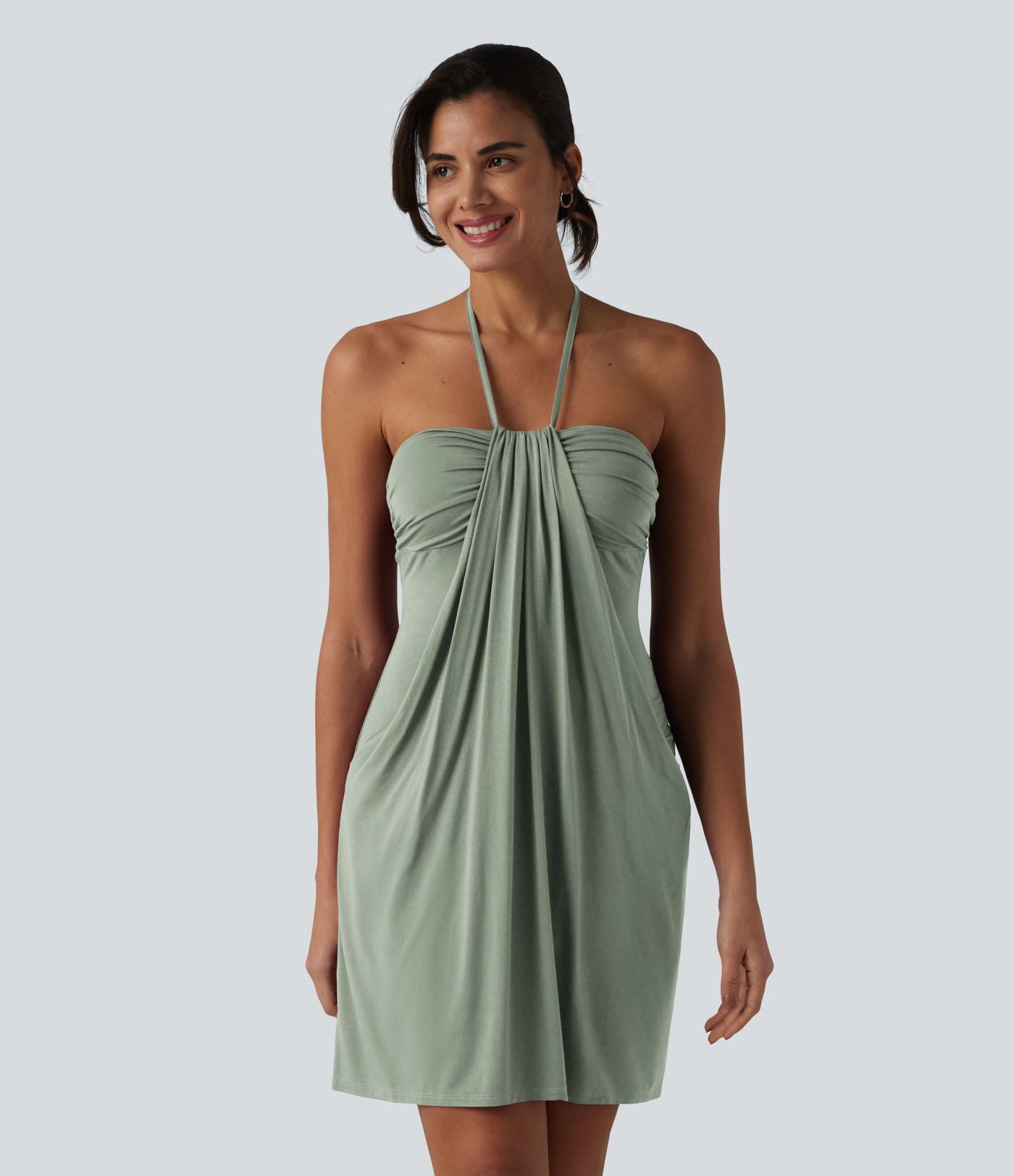 Robe resort mini dos nu à col licou avec lien noué dans le dos et poches
