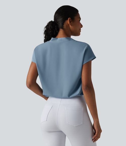 Blouse esprit bureau ample défroissage facile, col V et manches chauve-souris