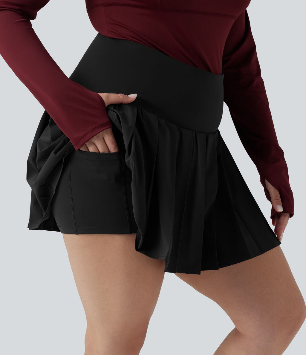 Breezeful™ Jupe-short yoga mini 2-en-1 grande taille à plis et ourlet asymétrique, taille haute, séchage rapide avec poches