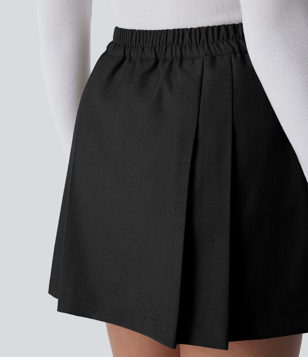 Mini-jupe plissée taille haute 2-en-1 avec fermeture éclair invisible