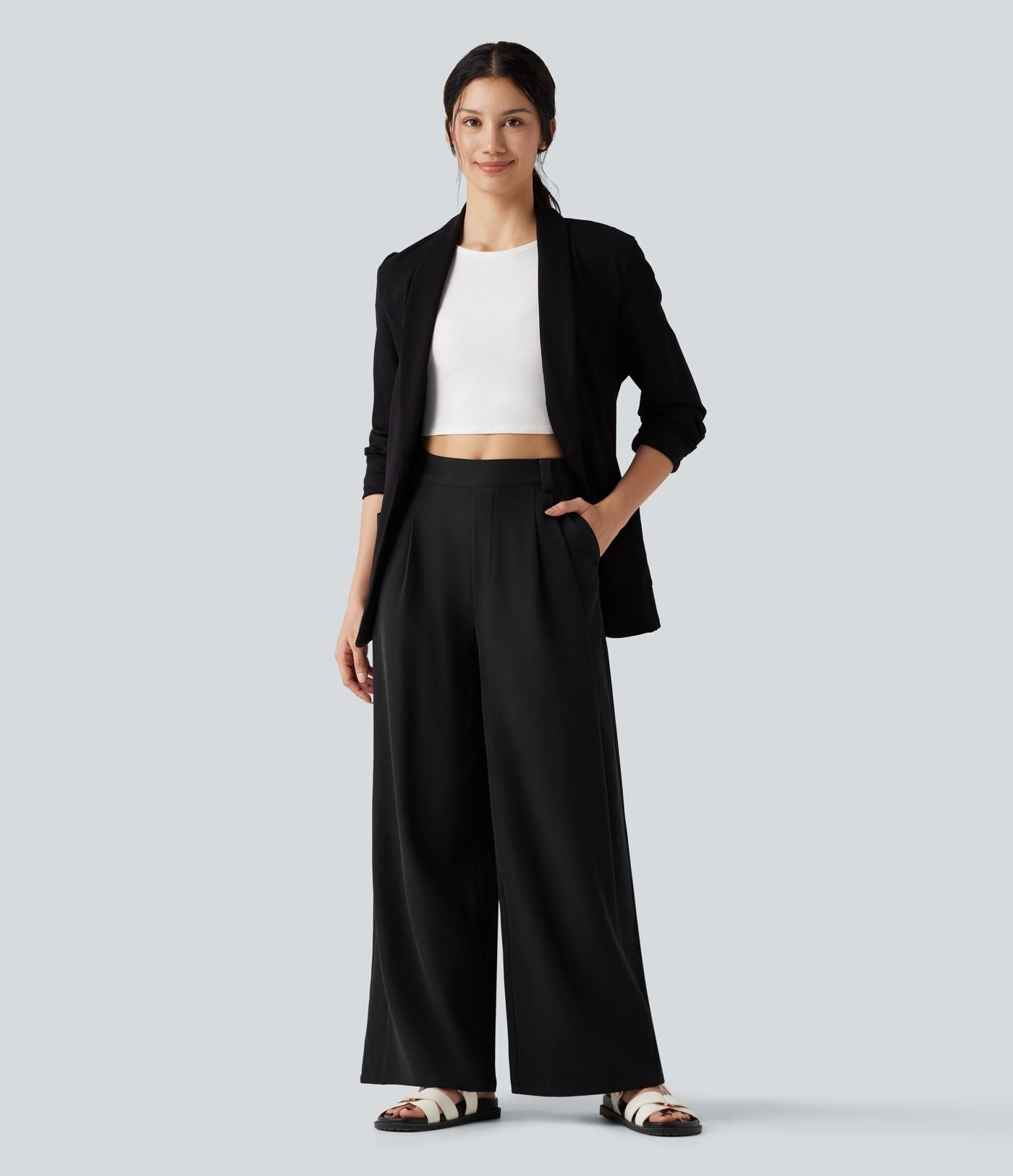 Pantalon tailleur large, taille moyenne, à poches