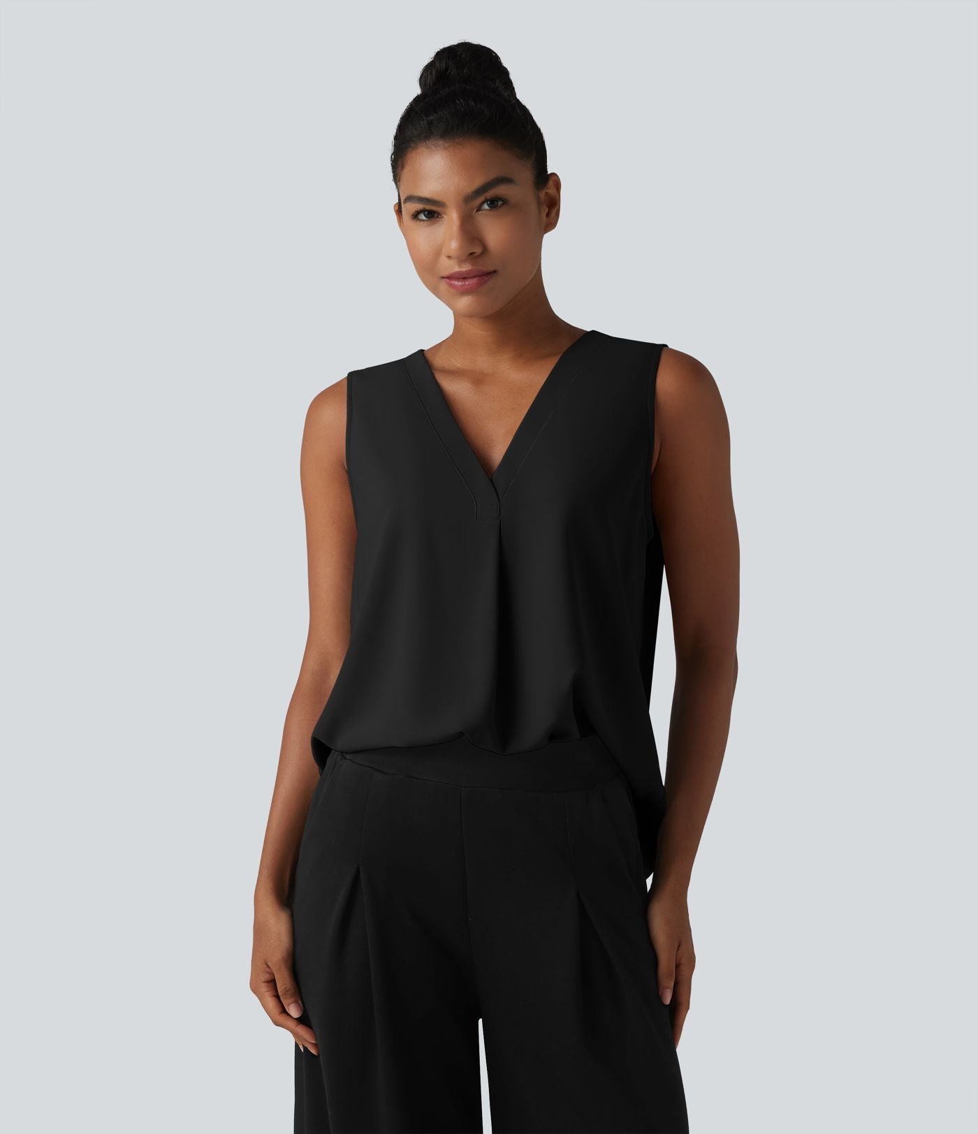 Blouse esprit bureau oversize défroissage facile, sans manches et col V