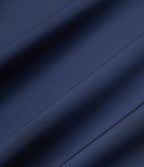 Robe de travail courte à décolleté en V, manches longues et ceinture