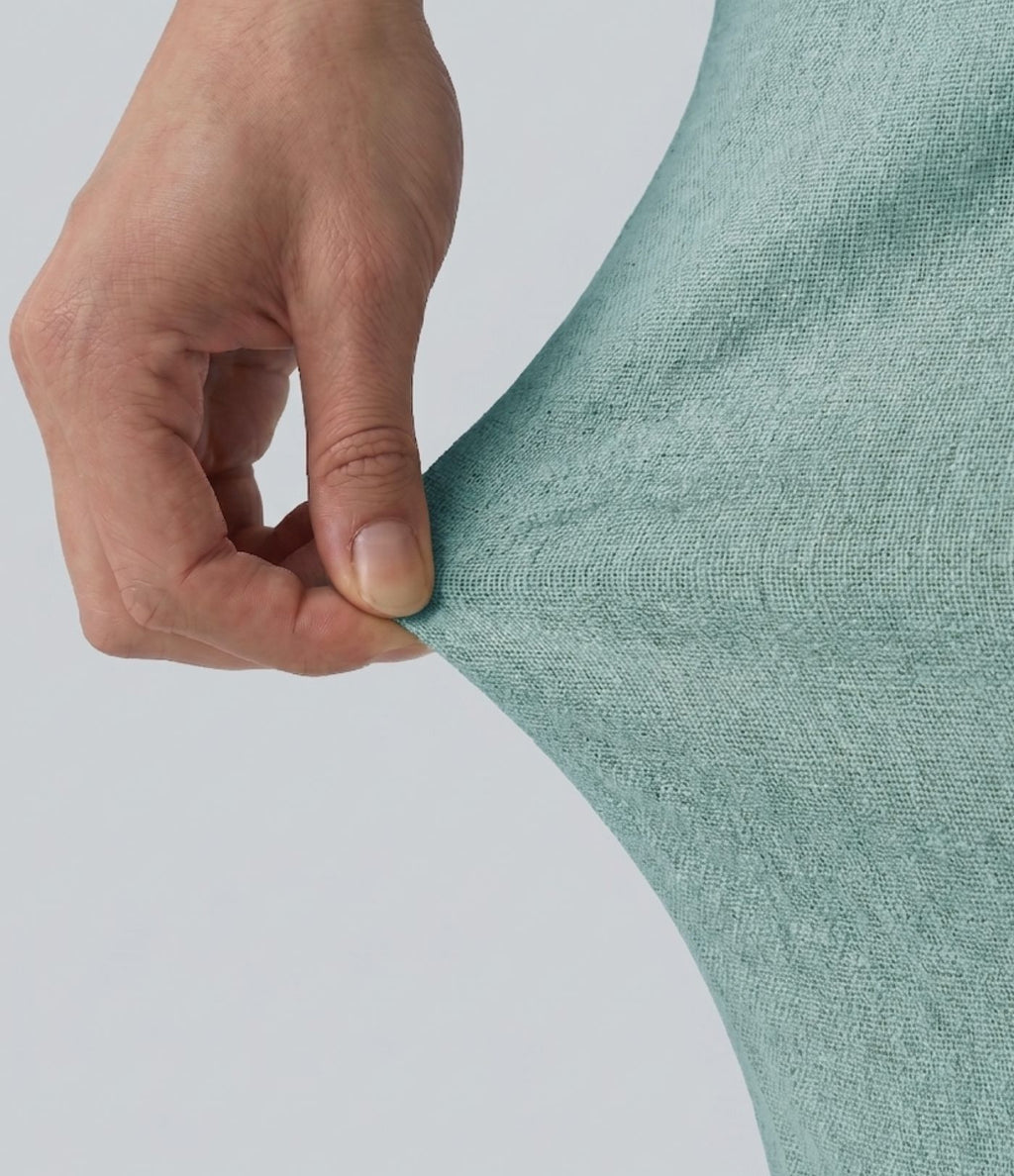 Pantalon baggy effet lin taille haute croisée avec détails froncés et poche