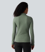 Haut de sport polaire demi-zip pliable à manches longues avec poche