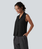 Blouse tailleur ample col revers sans manches à boutonnière