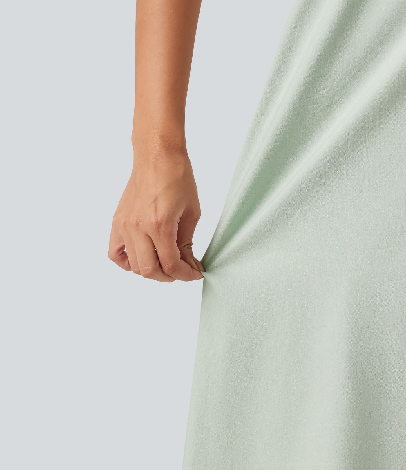 Robe mini sans manches en coton et lin à col rond avec poches