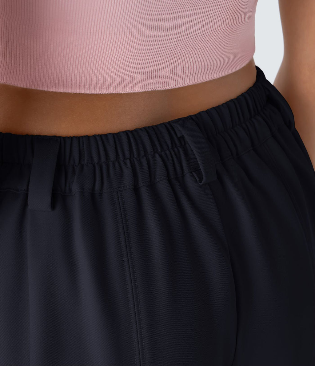 Pantalon tailleur ample, taille moyenne, coupe barrel, à poches